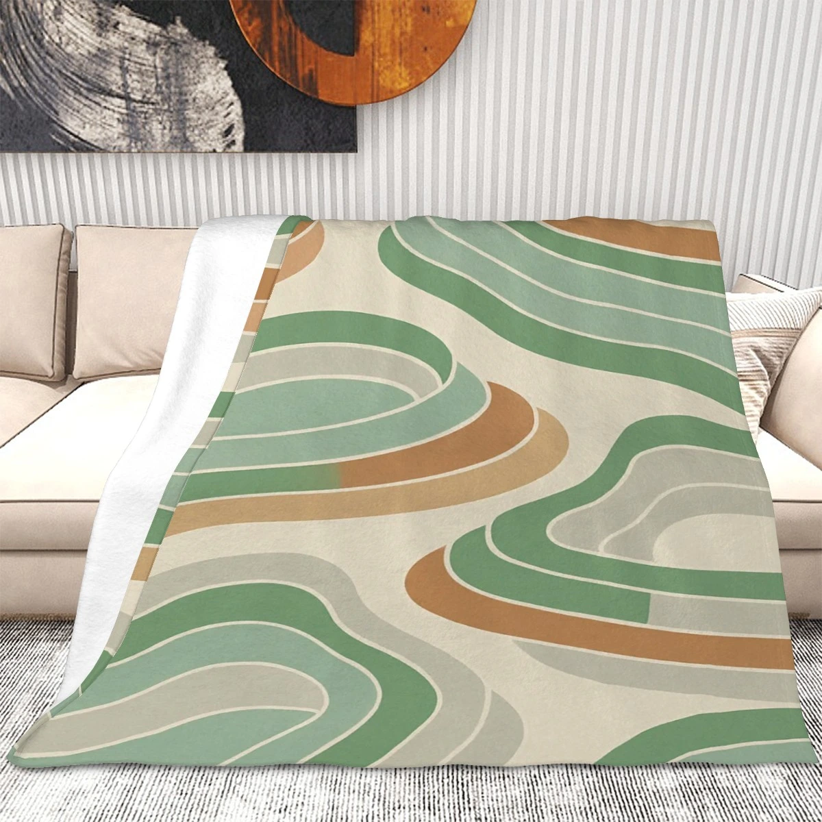 Folded Retro Throw Blanket Close-Up Folded flannel throw blanket with abstract stripes in earth tones